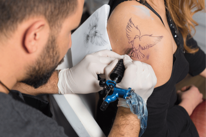 how much does a tattoo artist make, average tattoo artist salary